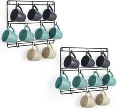 two racks with cups hanging from them and one rack holding coffee mugs on it