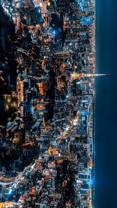 an aerial view of a city at night