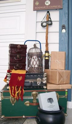 a stack of luggage sitting next to a blue door