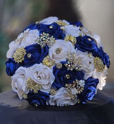 a bridal bouquet with blue and white flowers