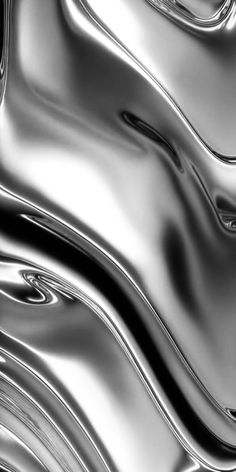 an abstract silver background with wavy lines