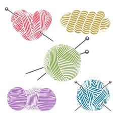 knitting needles and balls of yarn on a white background