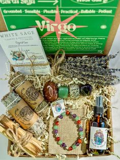 an open gift box filled with various items