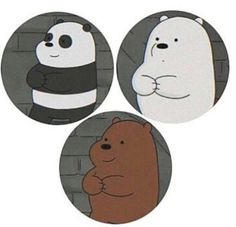 three cartoon panda bears standing in front of a brick wall