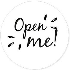 an open me sticker with the words open me in black ink on a white background