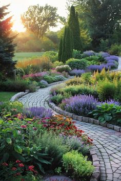 a garden with lots of different types of flowers and plants in it, along side a brick path