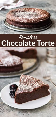 a chocolate torte with powdered sugar on top and blackberries in the foreground