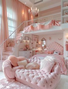 a bedroom with pink furniture and chandelier hanging from the ceiling in front of a staircase