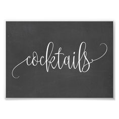 a chalkboard with the word cocktails written in cursive writing on it