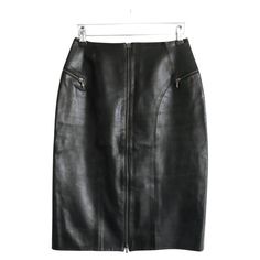 Fabulous, rare Christian Dior vintage leather skirt from the Fall 2000 collection (look 4 on the runway). Worn once. Made from super soft, smooth black lamb leather with a black silk lining and antique look matte gold hardware. It has a tapering pencil cut with full length front zip and hip wrapping zip pockets. Size FR36/UK8. Measures approx - waist 25”, hips 34” and length 18". Dior Vintage, John Galliano, Geek Chic, Matte Gold, Black Silk, Vintage Leather, The Fall, Christian Dior, Leather Skirt