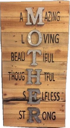 a wooden sign with words on it that say amazing, loving, beautiful and truthful