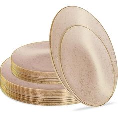 a stack of pink and gold plates sitting next to each other on a white surface