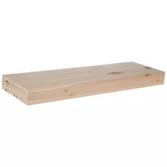 a wooden shelf sitting on top of a white wall in front of a white background