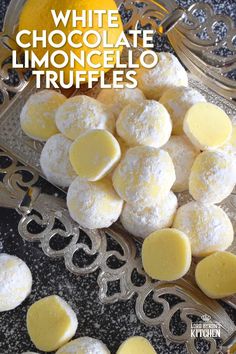 white chocolate limocello truffles on a silver platter with lemons