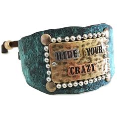 a leather bracelet with words and beads on it that says hide your crazy