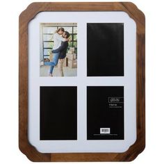 a wooden frame with four photos in it