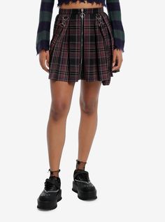 Combine edgy vibes with scholarly sophistication with this pleated skirt! Perfect for the dark academia look  this black and purple skirt features removable suspender straps  plus a zipper on the front with O-ring detailing.Please note: Style is fitted with no stretch; size up for a looser fit.65% polyester; 35% rayonWash cold; dry flatNon-stretch materialLength: 32''ImportedListed in junior sizesModel is 5'9''Model wears size Small Hot Topic Skirts, Academia Look, Dark Academia Look, Cutesy Outfit, Edgy Vibes, Hot Topic Shirts, Purple Skirt, Suspender Skirt, Purple Plaid