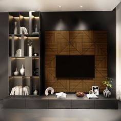 a modern living room with an entertainment center and built - in bookshelves on the wall