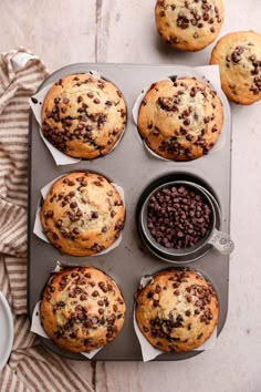 chocolate chip muffins are in the muffin tin