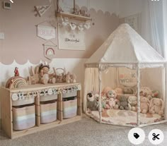 a child's room with stuffed animals and toys on the floor next to a play tent