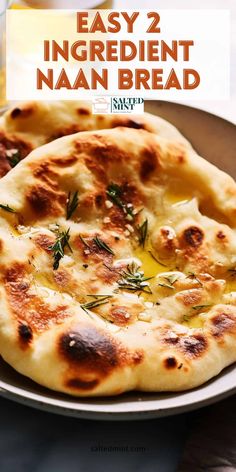 two homemade naan breads on a plate with text overlay that reads easy 2 ingredient naan bread