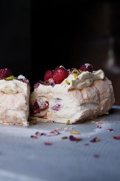 a magazine cover with a piece of cake on top of it and some raspberries in the middle