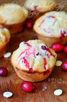 some cranberry muffins on a wooden table