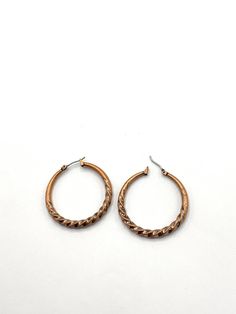 Gorgeous collectible copper round earring by Lia Sophia. Vintage Small Hoop Metal Earrings, Bronze Metal Hoop Earrings For Pierced Ears, Bronze Single Earring Made Of Copper, Vintage Bronze Hoop Earrings With Ear Wire, Bronze Vintage Hoop Earrings With Ear Wire, Brown Metal Hoop Jewelry, Bronze Small Hoop Metal Earrings, Small Bronze Metal Hoop Earrings, Small Bronze Hoop Earrings