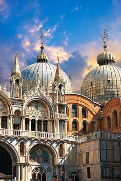 an ornate building with many domes on top