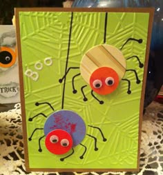 a close up of a card with two bugs on it