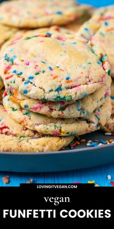 vegan funfetti cookies with sprinkles on a blue platter