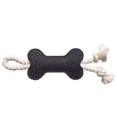 a black and white dog bone on a rope