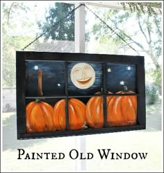 an old window has pumpkins painted on it and the words painted old window are written below