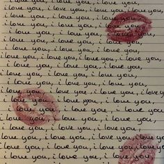 a handwritten love letter with two red lips