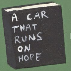 a black box with writing on it that says, a car that runs on hope