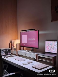 a desk with a monitor, keyboard and mouse on it