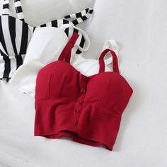 halter top, stylish versatile slim top, vintage crop topMaterial:blendedColor:black,red,white,black and white stripesStyle:sexyFeatures:vintageSize(cm):one size 1inch=2.54cm 1cm=0.39 inchLength 35cm Bust 66-98cm<p>Note:Due to different measurement methods,there will be 1-3 error(unite:cm), please understand.</p><br/><p>Please check the size carefully when choosing. Thank you.</p><br/> Red Fitted Halter Top With Built-in Bra, Fitted Red Halter Top With Built-in Bra, Fitted Cotton Halter Top With Built-in Bra, Fitted Crop Top With Built-in Bra For Summer, Fitted Cotton Crop Top With Built-in Bra, Red Vest Crop Top For Summer, Trendy Halter Neck Top With Built-in Bra, Red Vest Crop Top For Spring, Trendy Red Halter Neck Tank Top