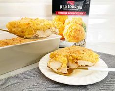 a white plate topped with food next to a box of red lobster casserole