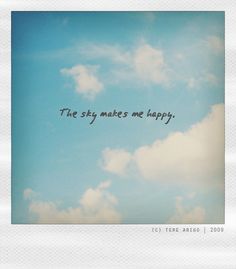 the sky makes me happy, polaroid print with text on it and clouds in the background