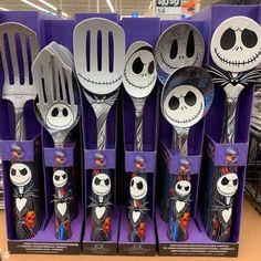 a set of forks and spoons with jack skellingy faces on them for sale