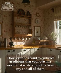 a kitchen with flowers on the wall and a quote about love in it that reads, don't ever be afraid to embrace traditional traditions that you love in a world that wishes