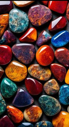 many different colored rocks are arranged together