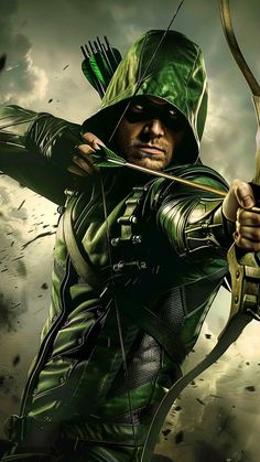 a man dressed in green is holding a bow and arrow