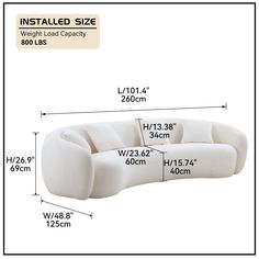 the white couch is measurements for it's size and features an extra long armrest