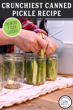 a person is cutting up some pickles on a table with the title text overlay reads crunchest canned pickle recipe