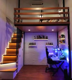 a room with some stairs and a desk in it