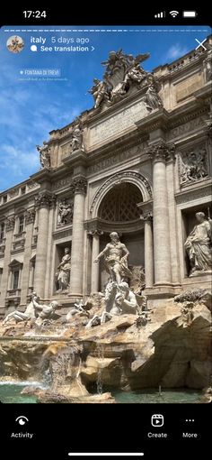 an image of a building with statues on the front and side walls, including a fountain