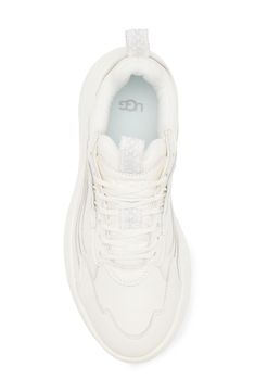 This sporty sneaker features tonal webbed elements and plush cushioning with a padded collar and tongue to enhance your comfort. Leather upper/textile lining/synthetic sole Imported White Tennis Shoes, Sporty Sneakers, New Years Eve Outfits, Flip Flop Slippers, Trainer Sneakers, Jean Shirt Dress, Sports Blazer, Suit Shop, Sunglasses Shop