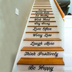 stair decals with words and phrases on them