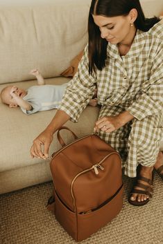 Not only is it the stylish bag the amount of baby items mum things whatever you can fit and not look like your carrying a camping bag on you is such a huge help for mums. I really love how easy it is to wipe down if anything gets on it but how supportive it is for all day wearing and chasing lil toddlers. I can’t thank enough for oioi changing the game for me and my son!! I would recommend this brand a million times over and I can’t wait to reuse this again when number two comes hopefully soon. Me And My Son, Stylish Diaper Bag, Camping Bag